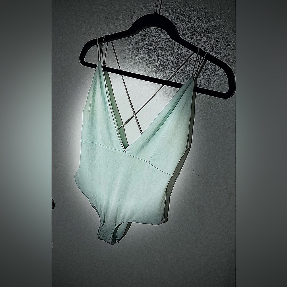 Daring super plunge V neck bodysuit
